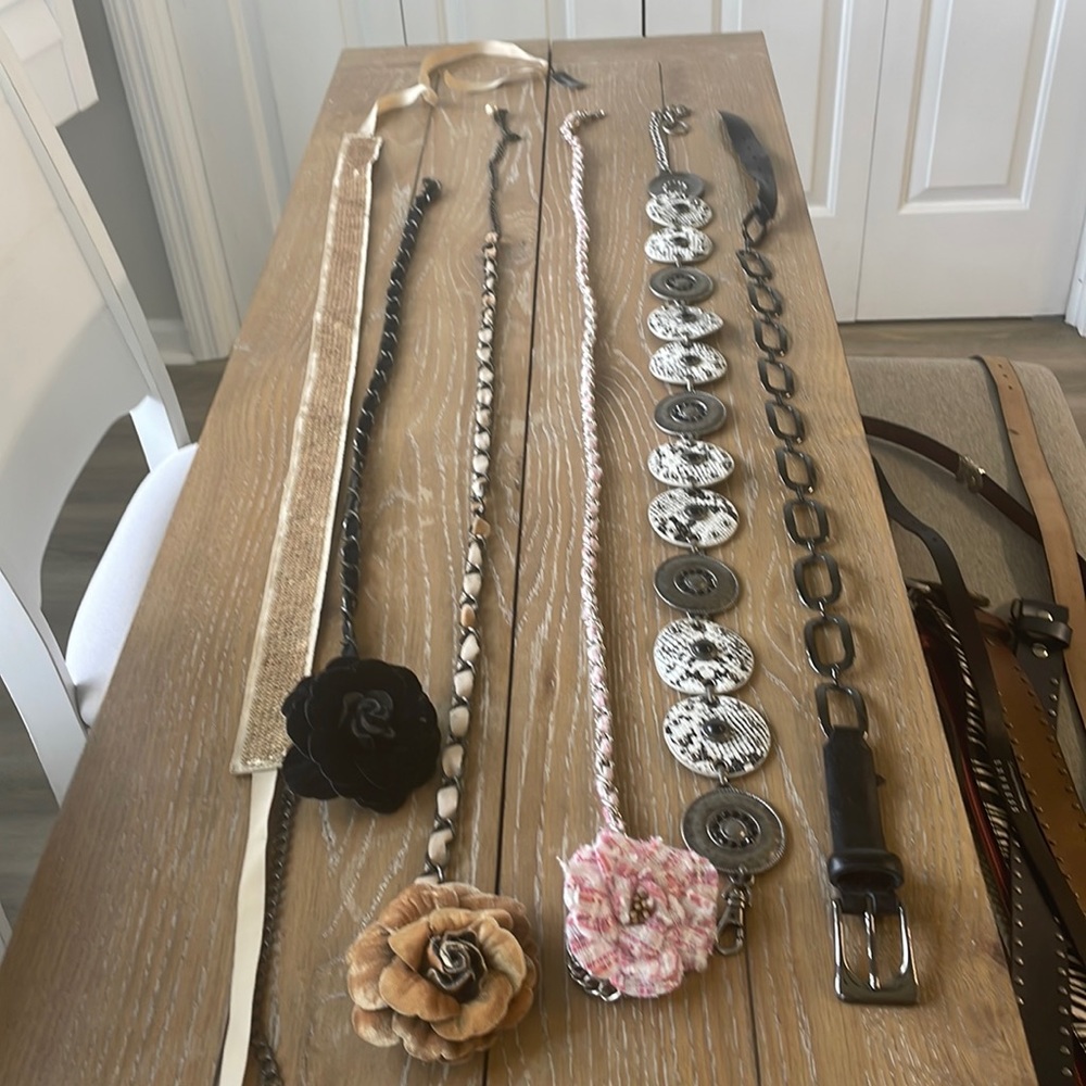 Assortment of belts. Adjustable or size medium